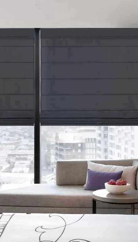 Dark color motorized blinds installed in a private apartment by Fatin Home Furniture